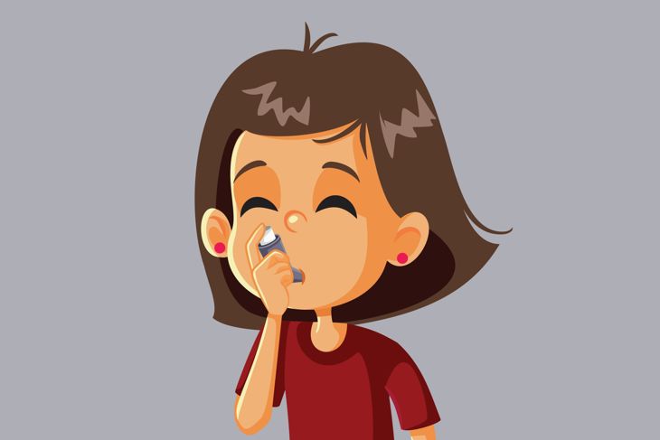 Illustration of a young girl with short brown hair using an asthma inhaler, eyes closed and mouth slightly open. She wears a red shirt and pink earrings, with a neutral gray background behind her.