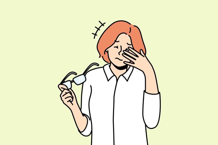 female struggle with dizziness or blurry vision