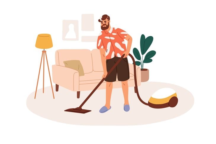 Mature man cleaning home