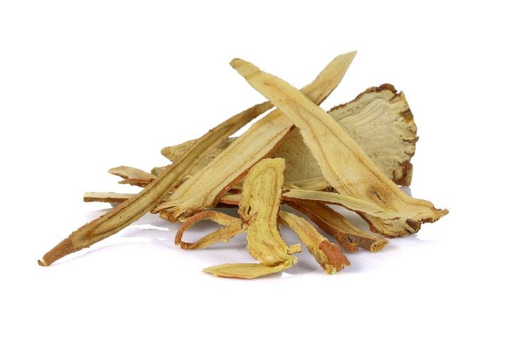 Slice Licorice roots on white background