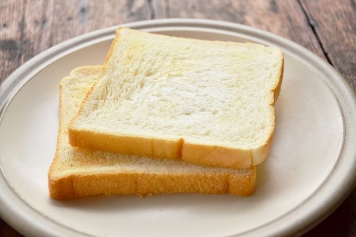 Bread on white dish.