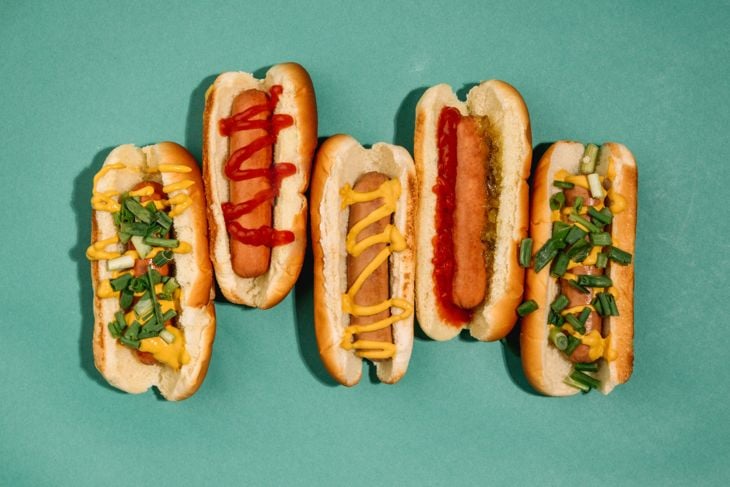 Hotdog sandwich with tomato and cheese photo