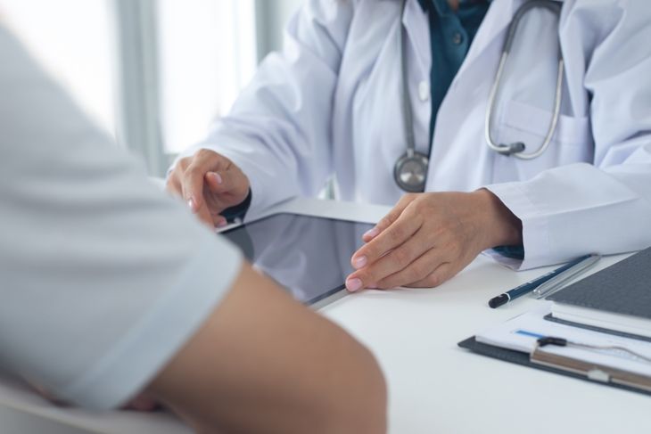 Doctor and patient at medical clinic