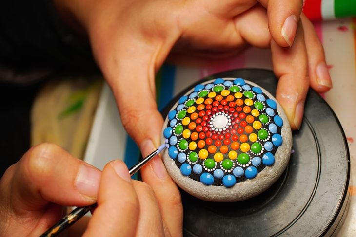Unleash Creativity and Brighten Outdoor Space with Painted Rocks