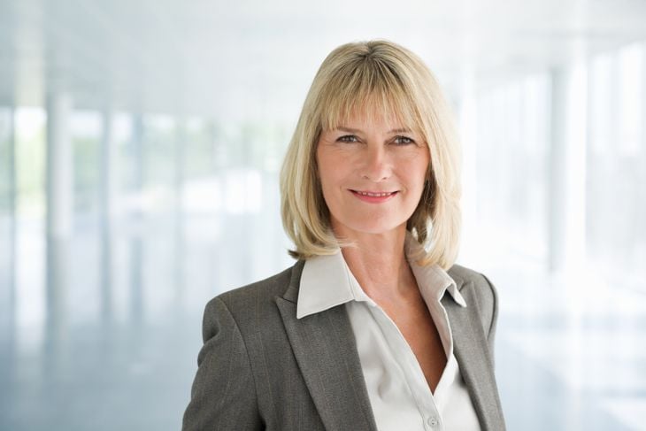 Portrait of a beautiful mature female executive smiling