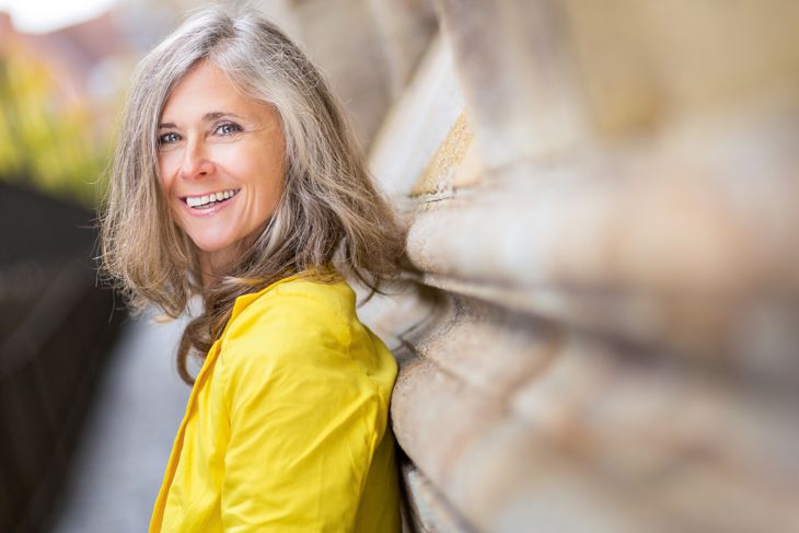 Portrait Of Happy Woman Looking At Camera
