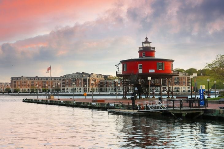 Seven Foot Knoll Lighthouse in Baltimore’s Inner Harbor at sunset, . This famous screwpile style lighthouse once stood watch atop Seven Foot Knoll in the Chesapeake Bay, Baltimore Maryland