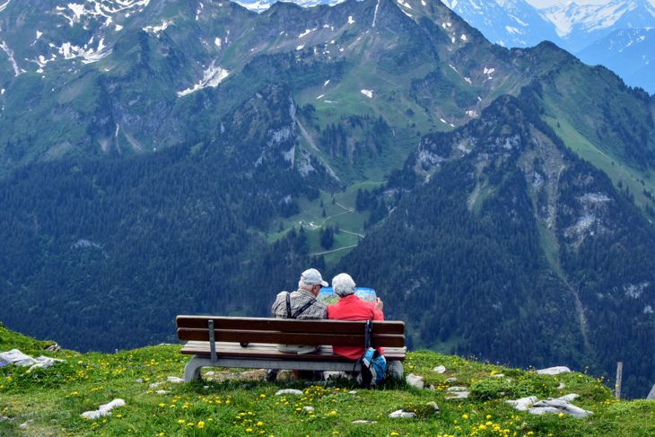elderly couple in the mountains