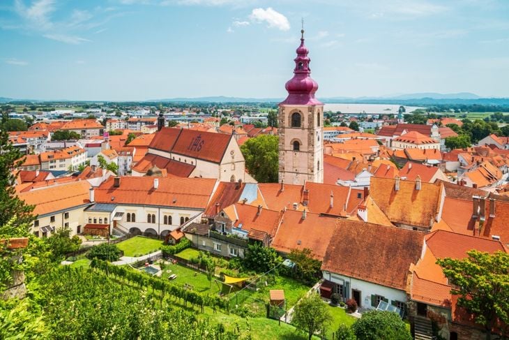 Old town of Ptuj with St. George's Church, view from castle hill, Ptuj, Slovenia