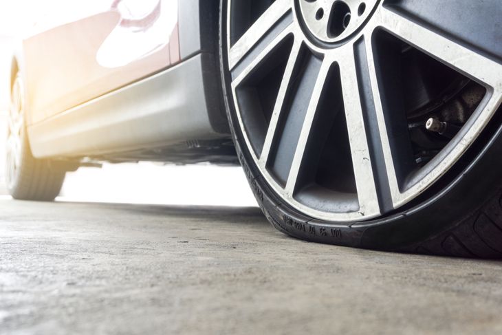 Close up of Run flat tires While there is air tire pressure lose in driving on street background