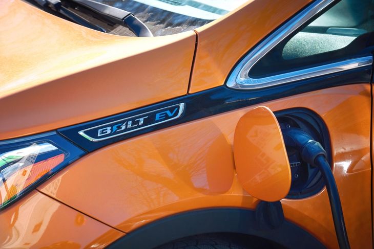 Chevrolet Bolt EV vehicle plugged getting electricity from power station