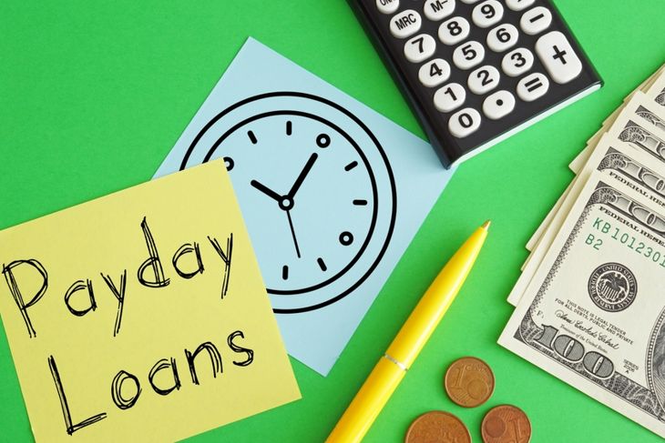 Payday loans are shown using a text and photo of dollars