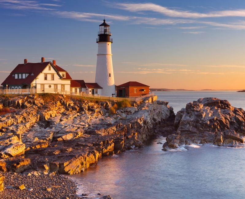 The Portland Head Lighthouse in Maine, USA at sunrise.