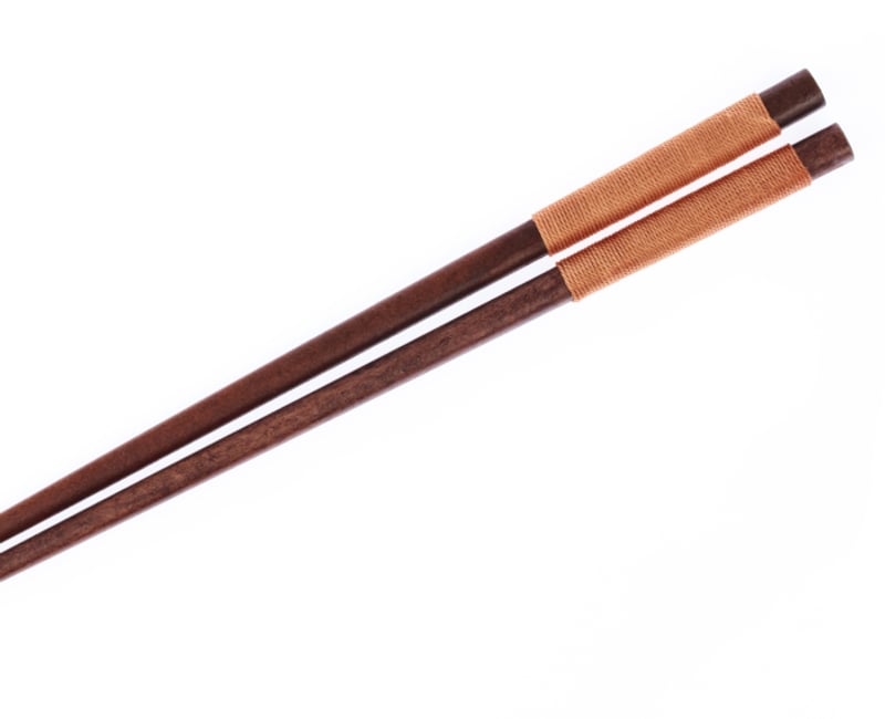 Wooden chopsticks isolated on white background
