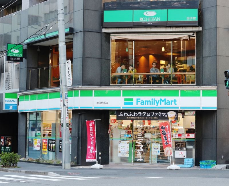 TOKYO, JAPAN - November 9, 2019: A building in Tokyo's Kanda area with a Familymart convenience store on its first floor and a Kohikan Coffeeshop on the second floor.