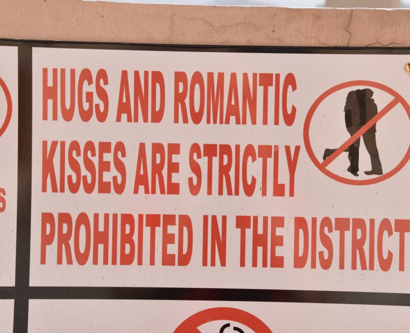 No Hugging and Kissing Sign