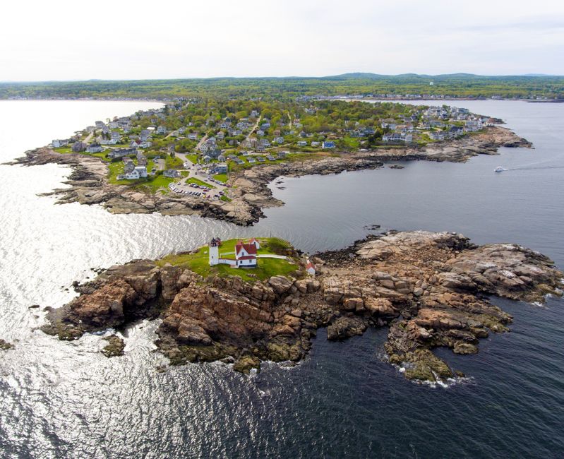Cape Neddick Lighthouse (Nubble Lighthouse) aerial view at Old York Village, Maine, USA.