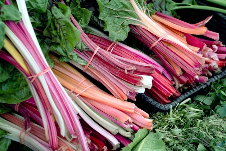 Freshly hand picked organic rhubarb at an open air farmers market.