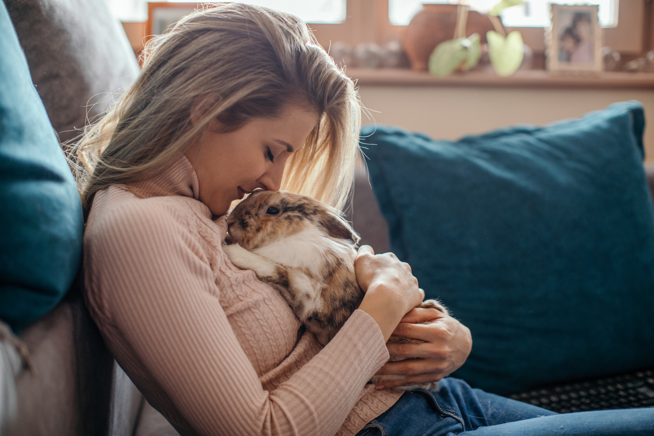 young woman and her bunny pet