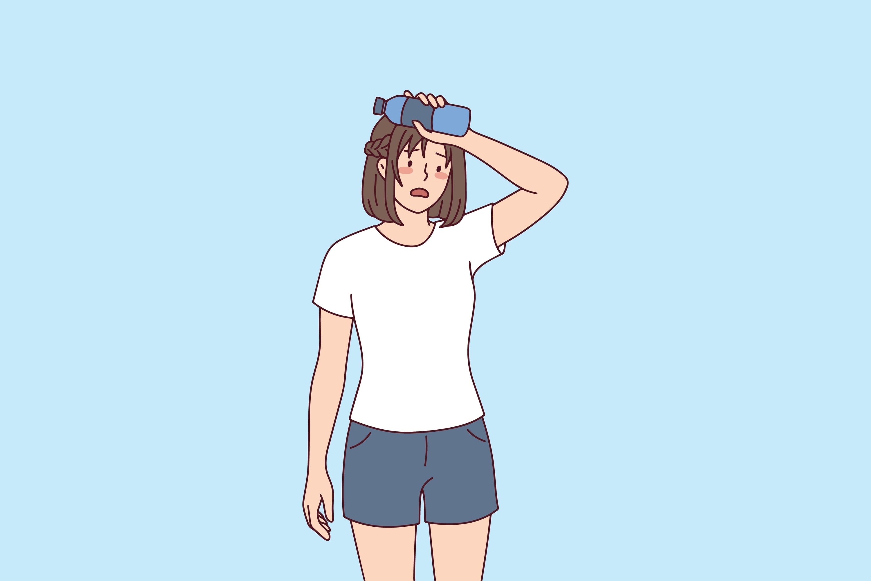 Tired woman cooling herself down with a water bottle against her forehead